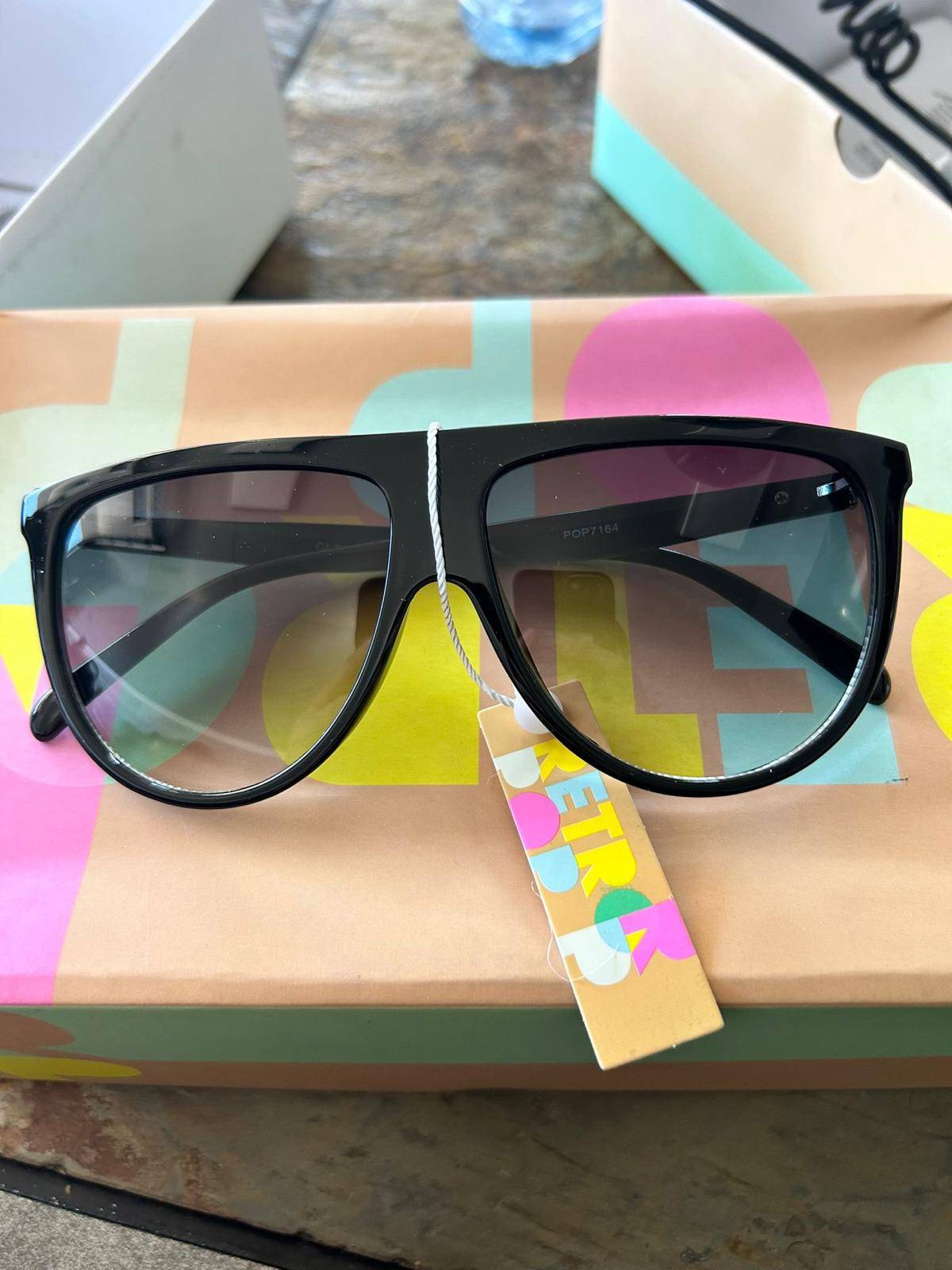 Flat-top black oversized sunglasses